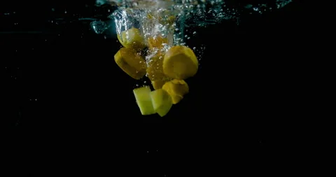 Vegetables falling into boiling water to make a vegetable soup. Stock Footage 147878669