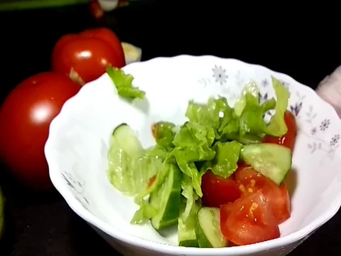 Vegetables fly in a plate Stock Footage 80687312