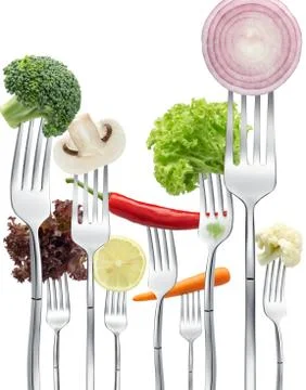 Vegetables on forks Stock Photos
