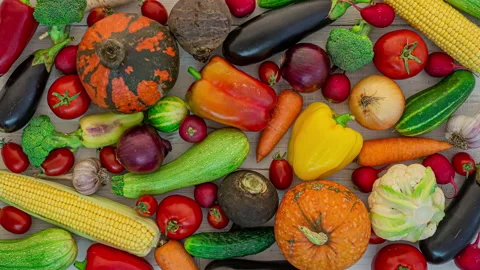 Vegetables frame on white wooden background, stop motion animation, 4K Stock Footage 141425664