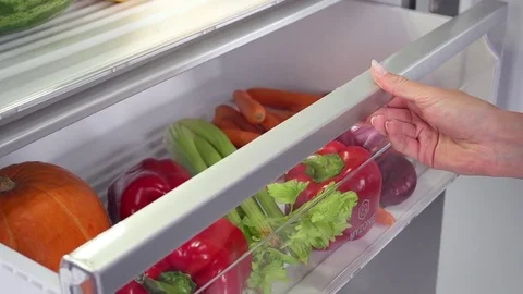 Vegetables in fridge in slow motion Stock Footage 73390728