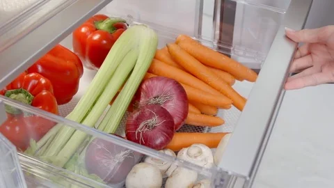 Vegetables in fridge in slow motion Stock Footage 73390887