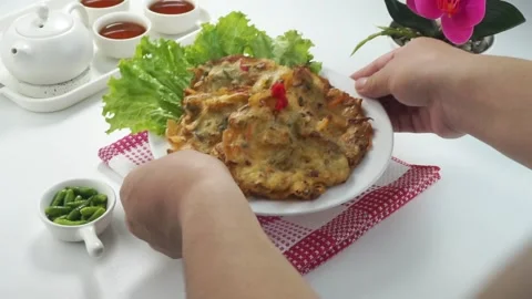 Vegetables Fried or Bakwan goreng or Bala bala is a traditional food from I.. Stock Footage 243799478