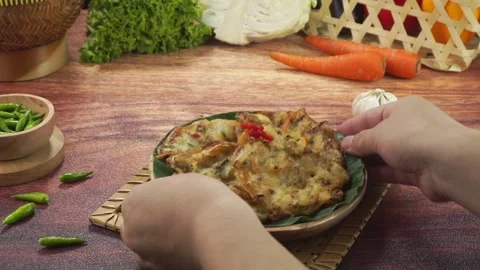 Vegetables Fried or Bakwan goreng or Bala bala is a traditional food from I.. Stock Footage 243799491