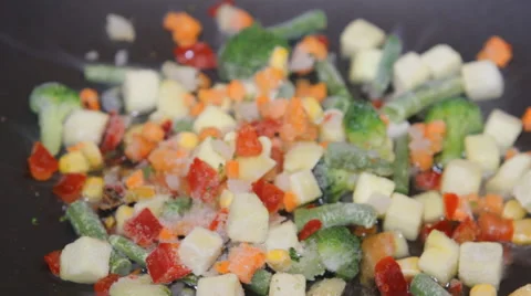 Vegetables fried in a pan Stock Footage 49603024