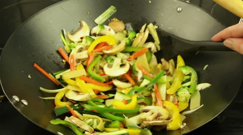 Vegetables frying Stock Footage 32658241