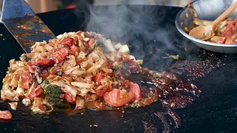 Vegetables on the frying pan. Stock Footage 248168198
