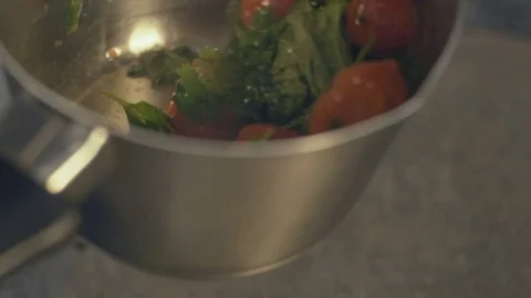 Vegetables in a frying pot, close up Stock Footage 70384221