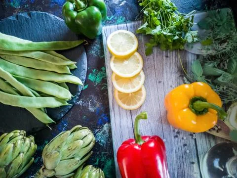 Vegetables from the garden in composition on dark background Stock Photos