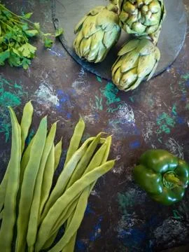 Vegetables from the garden in composition on dark background Stock Photos