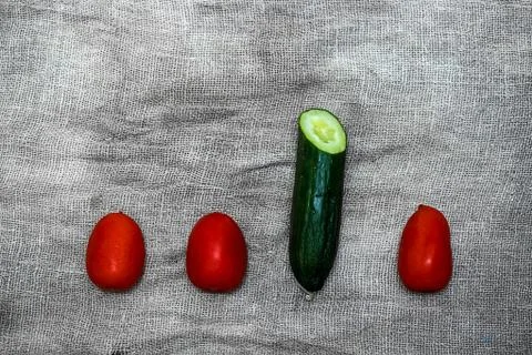 Vegetables on a gray background from flax. Stock Photos
