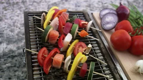 Vegetables on a grill in an archipelago setting Stock Footage 11339995