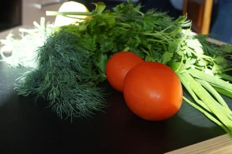 Vegetables with herbs in the sun Stock Photos