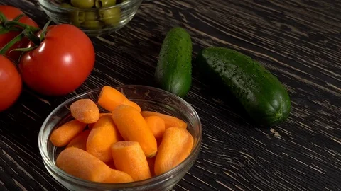 Vegetables ingridients for salad on rustic wooden background. Stock Footage 74714761
