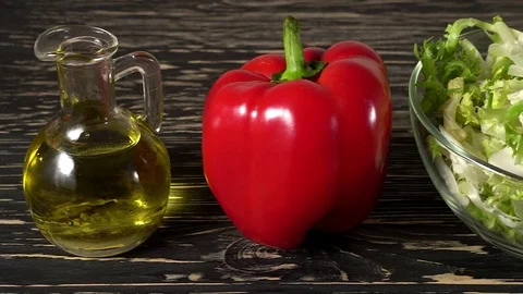 Vegetables ingridients for salad on rustic wooden background. Vidéo 74765683