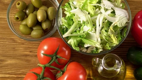 Vegetables ingridients for salad on rustic wooden background. 動画素材 74767086
