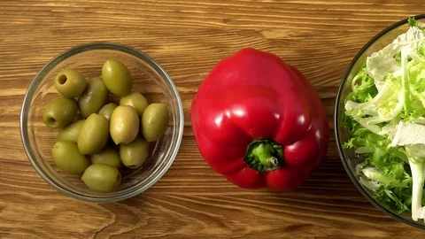 Vegetables ingridients for salad on rustic wooden background. Stock Footage 74778346