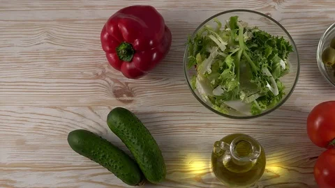 Vegetables ingridients for salad on rustic wooden background. 動画素材 74795324