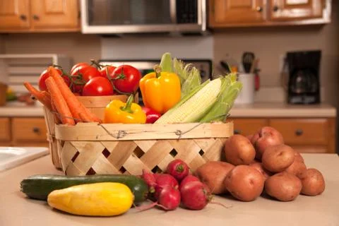 Vegetables on kitchen counter Stock Photos