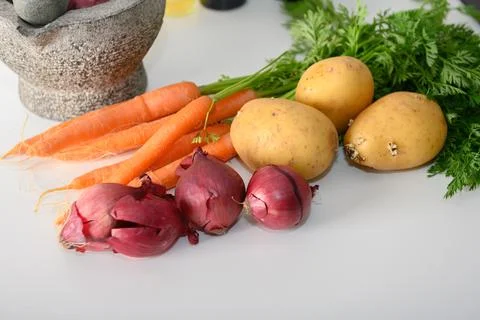 Vegetables on a kitchen table Stock Photos