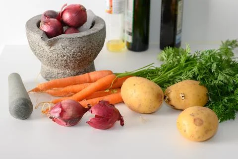 Vegetables on a kitchen table Stock Photos
