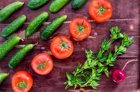 Vegetables on old wood surface Stock Photos