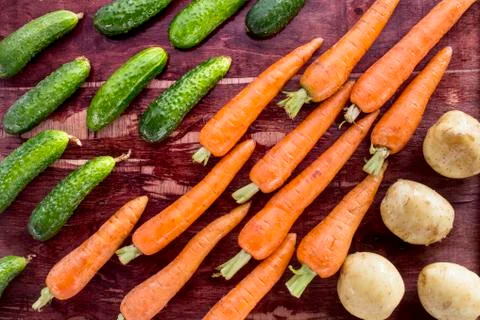 Vegetables on old wood surface Stock Photos