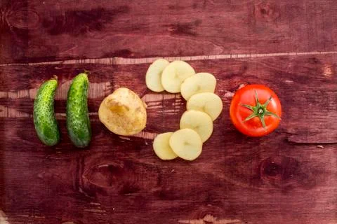 Vegetables on old wood surface Stock Photos