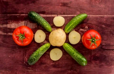 Vegetables on old wood surface Stock Photos