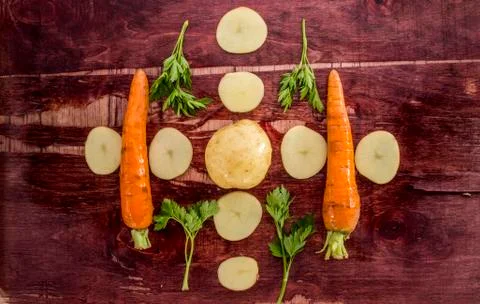 Vegetables on old wood surface Stock Photos