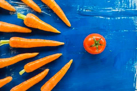 Vegetables on old wood surface Stock Photos