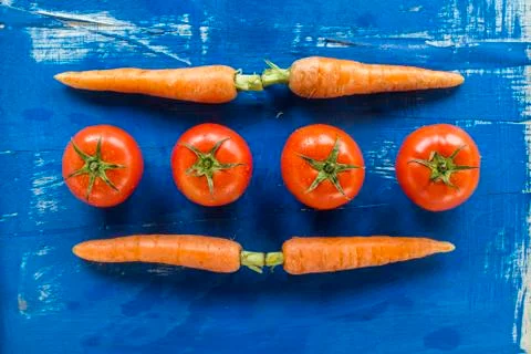 Vegetables on old wood surface Stock Photos