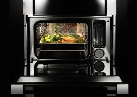 Vegetables in the oven Stock Photos