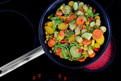 Vegetables in a pan. Stock Photos