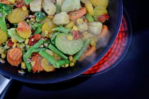 Vegetables in a pan. Stock Photos