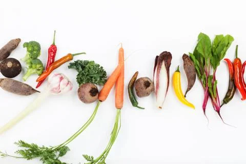 Vegetables path on white background Stock Photos