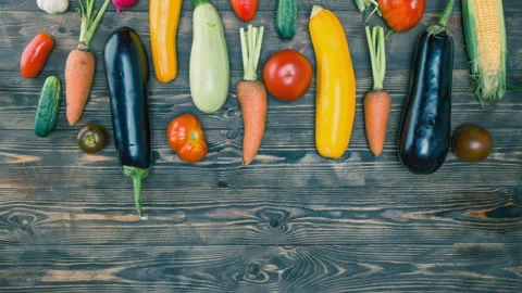 Vegetables: pepper, broccoli, tomatoes, garlic, cucumber, corn, onions, celery,  Stock Footage 102940713