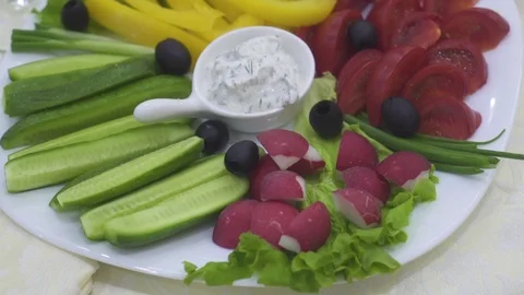 Vegetables on a plate on the holiday table Stock Footage 111729467