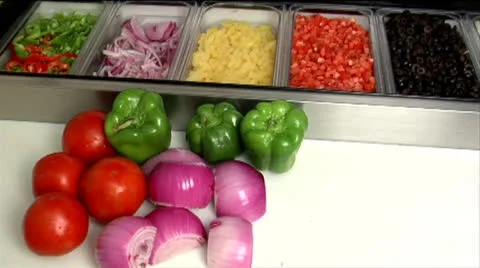 Vegetables at prep station 01 Stock Footage 24632511