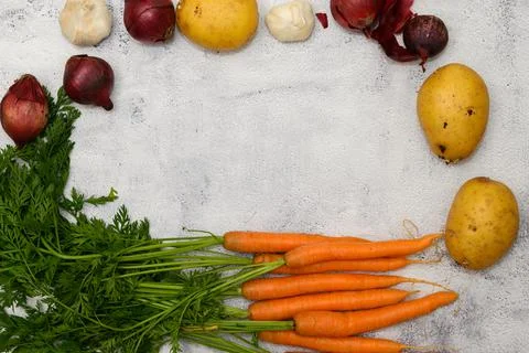 Vegetables on a rustic table Stock Photos