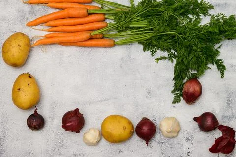 Vegetables on a rustic table Stock Photos
