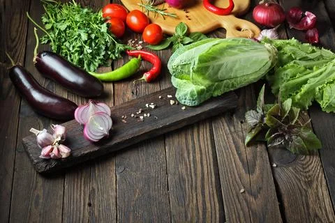 Vegetables on rustic wood background Stock-Fotos