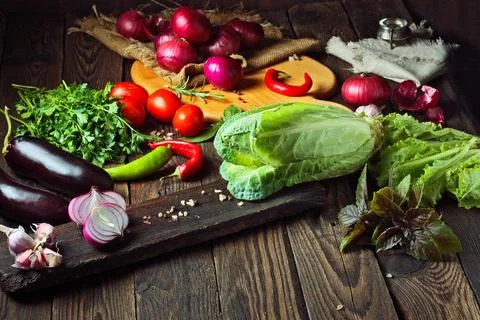 Vegetables on rustic wood background Stock-Fotos