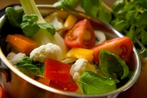 Vegetables in saucepan Stock Photos