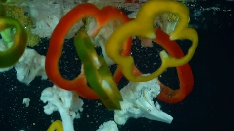 Vegetables splash in water HD Stock Footage 85274065
