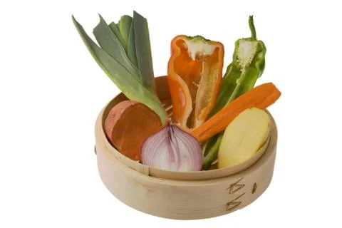 Vegetables in steamer Stock Photos