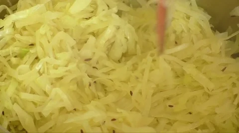 Vegetables stewed cabbage on a frying pan Stock-Footage 63113537
