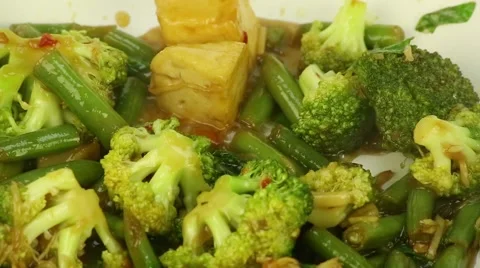 Vegetables stewed in a pan Stock Footage 57523544