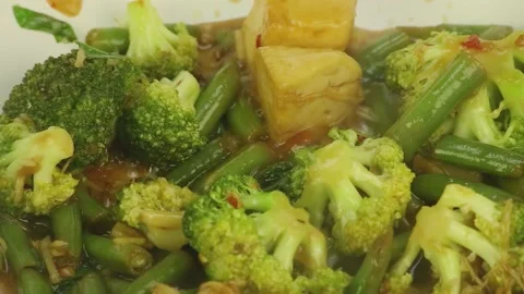 Vegetables stewed in a pan Stock-Footage 184584623