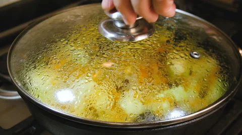Vegetables stirred in a pan Stock Footage 66240011